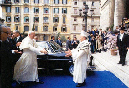 010_PopeEmbracesRabbi_ActMay-June2003.jpg - 72098 Bytes